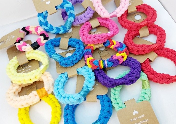 Hand-Braided Colorful Hair Bands Display - Image 3