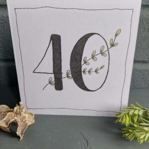 milestone birthday card featuring bold 40 and leaf stem decoration in green