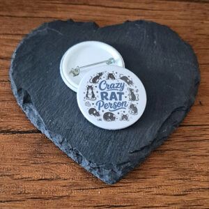 Funny rat lover badge design with the phrase 'Crazy rat person' in playful lettering, decorated with small rat illustrations and doodle accents.