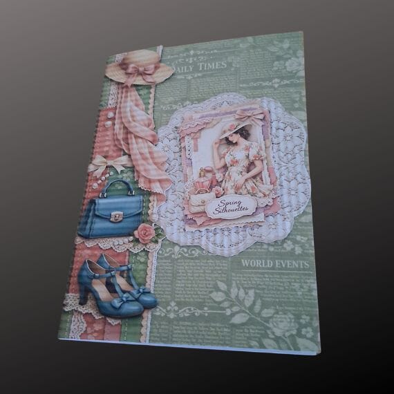 Fashion themed greeting card for a female to celebrate a birthday etc. green colour base paper with news items