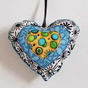 Handmade Fabric Hanging Heart Decoration Double-Sided Padded Ornament on white background