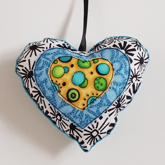 Handmade Fabric Hanging Heart Decoration Double-Sided Padded Ornament on white background