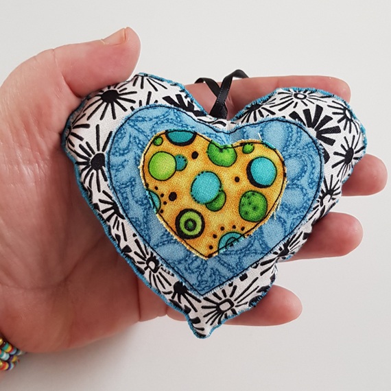 Handmade Fabric Hanging Heart Decoration Double-Sided Padded Ornament on white background