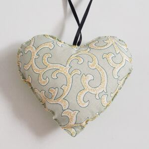 Handmade Fabric Hanging Heart Decoration With Rock And Roll Piano on the front shown here on a white background