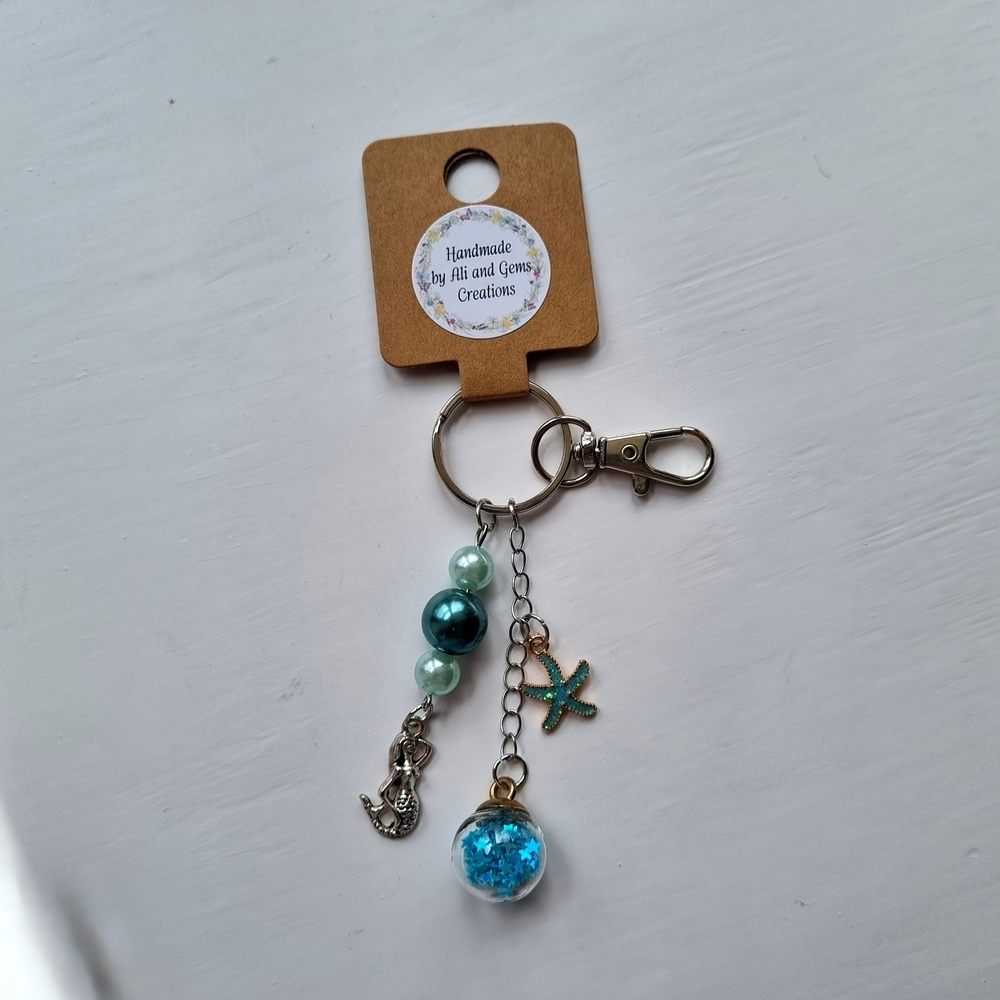 Handmade Mermaid Green and Blue Beaded Bag Charm with Metal and Glittery Starfish Charms - Image 2