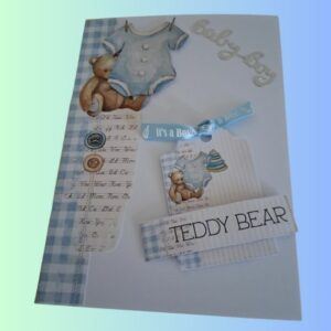 New Baby Boy Card with teddy Bears with blue baby grow, tag with blue ribbon reading "its a boy"