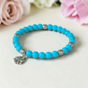 Dyed Turquoise Beaded Bracelet With Flower Charm