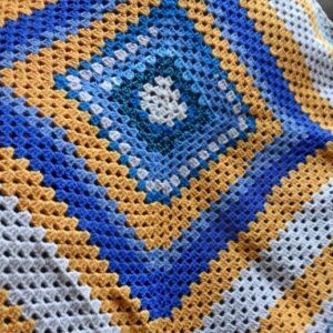 ‘Sea, sand and sky’. Crocheted Wool blanket/ throw. Proceeds to The Stroke Association