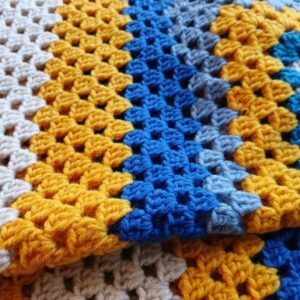 ‘Sea, sand and sky’. Crocheted Wool blanket/ throw. Proceeds to The Stroke Association