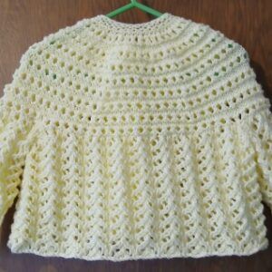 Hand- knitted baby cardigan in lemon. Approx 3 to 6 mths. All proceeds to The Stroke Association