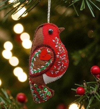 The robin. A symbol of hope, remembrance and fresh beginnings. A hand embroidered decoration. All proceeds to The Stroke Association. - Image 2
