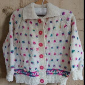 Hand knitted child’s cardigan. Approx 1 to 2 yrs. 50% wool. Charity Proceeds.
