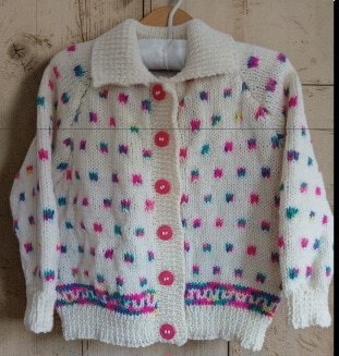 Hand knitted child's cardigan. Approx 1 to 2 yrs. 50% wool. Charity Proceeds.