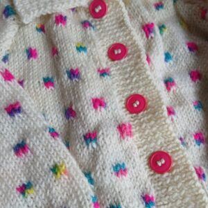 Hand knitted child’s cardigan. Approx 1 to 2 yrs. 50% wool. Charity Proceeds.