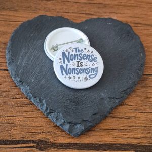 Funny relatable badge design with the phrase 'The nonsense is nonsensing' in playful lettering, decorated with small stars, swirls and doodle accents.