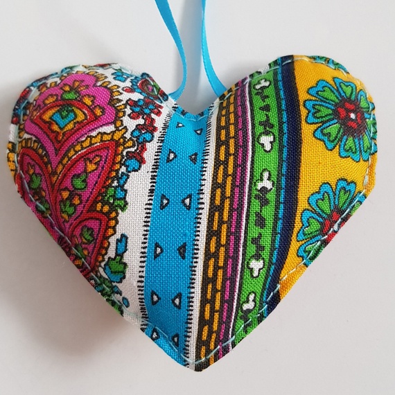 Bright Multicoloured Vintage Floral Hanging Heart Decoration On A White Background