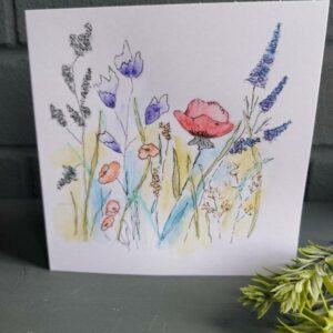 White 52 x 52 card featuring hand-drawn wildflowers in watercolours and ink