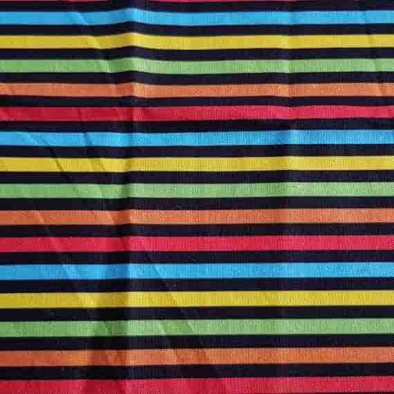 Colourful rainbow stripe fabric with bold horizontal red, blue, yellow, green and orange stripes on black.