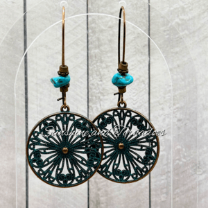 Handmade bronze-tone filigree drop earrings featuring genuine turquoise howlite gemstone chips and intricate openwork circular charms, creating elegant boho-inspired jewellery with vintage appeal.