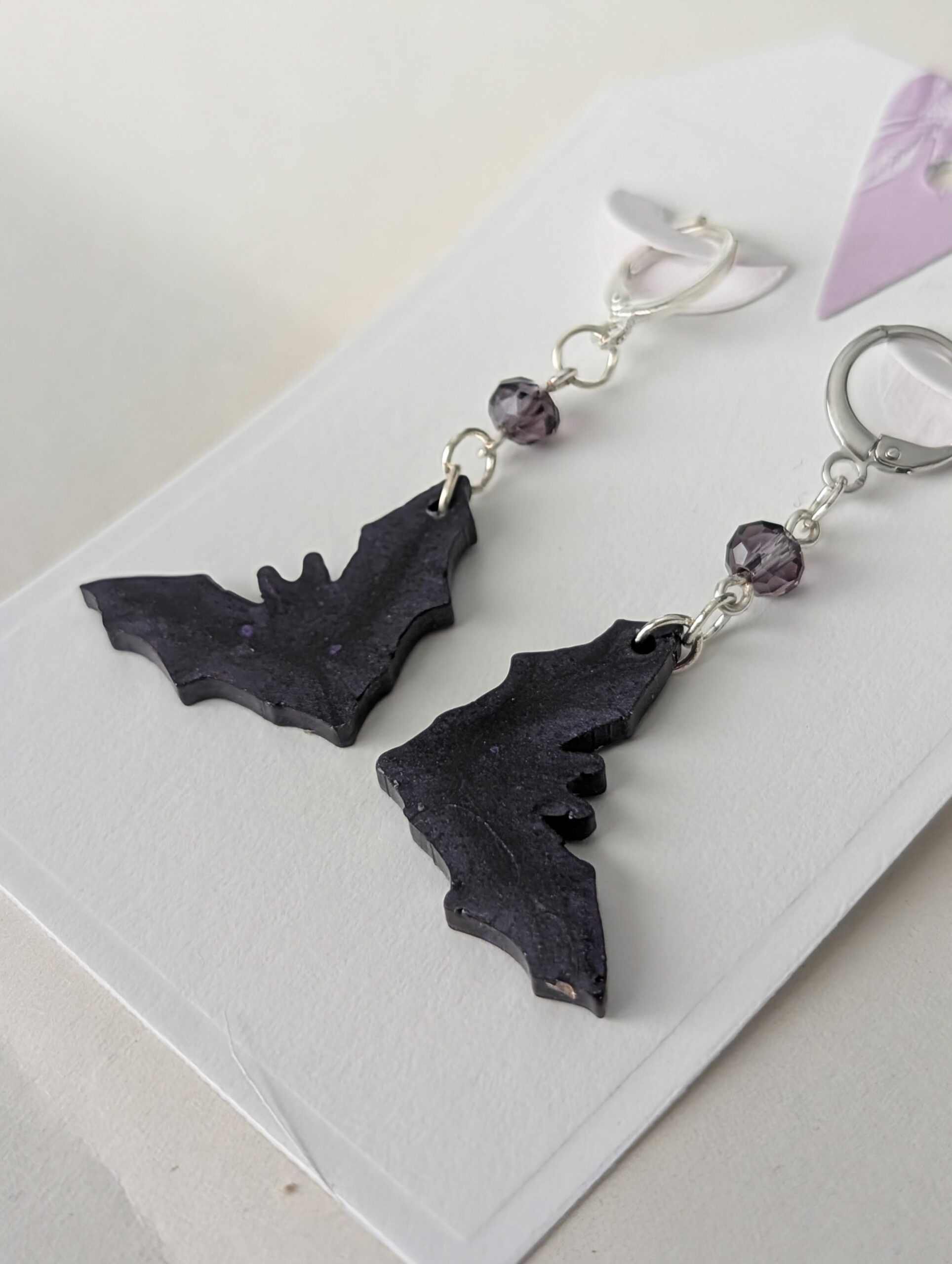 Chic Resin Bat Earrings with Crystal Bead Accents - Image 2