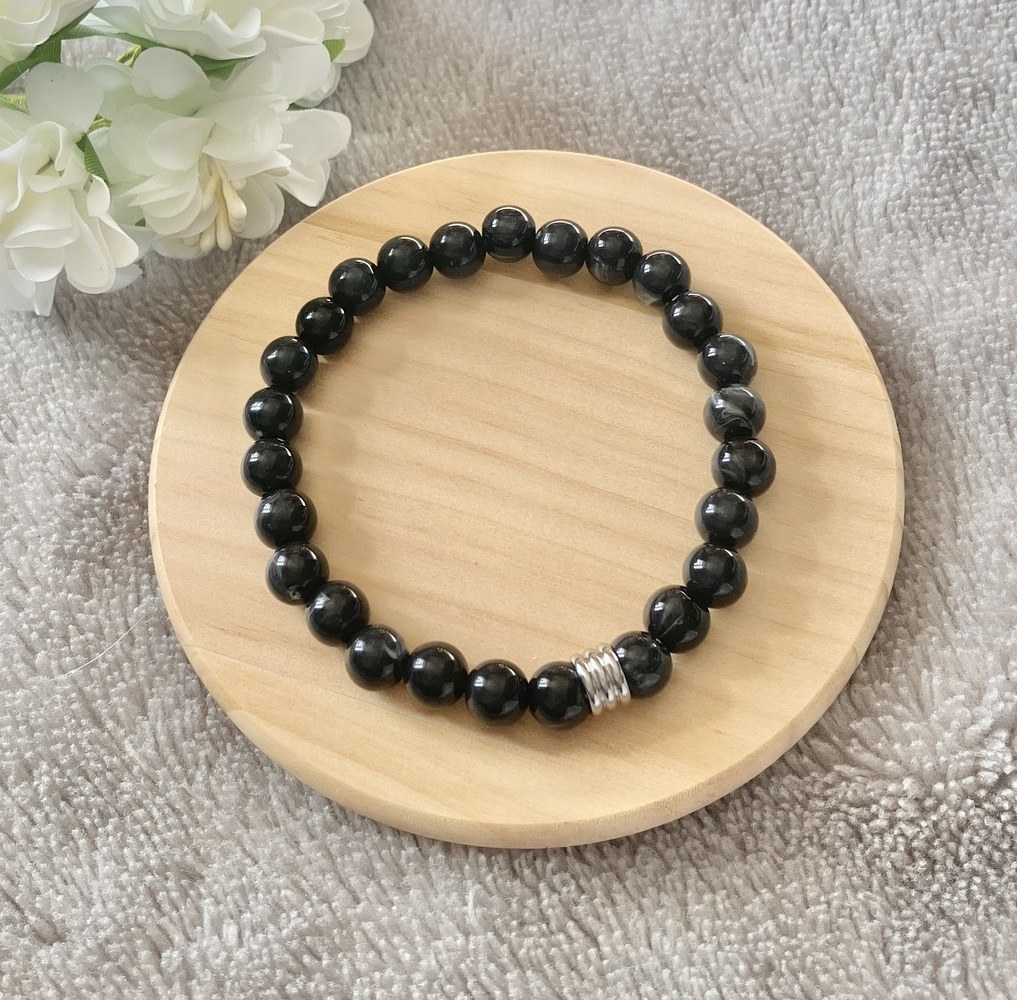 Men's Black and White Bead Stretch Bracelet With Ridged Silver Barrel Bead