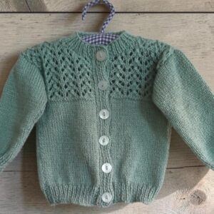 Hand- knitted baby jumper Approx 3 to 6 mths. 50% wool.All proceeds to The Stroke Association