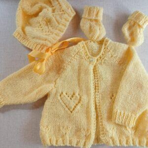 Hand knitted baby matinee set. Approx 0 to 3 mths. All proceeds to The Stroke Association