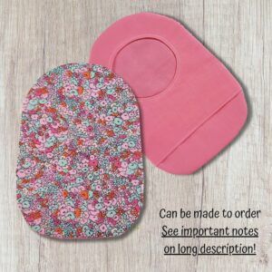 Handmade pink flower made-to-order stoma bag cover with a coordinating pink reverse. A UK-made fashion accessory for colour, privacy and everyday confidence.