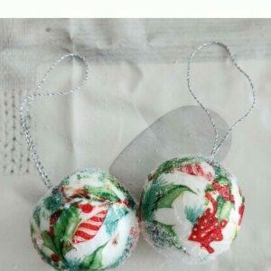 Set of 2 decoupaged polystyrene baubles, with holly and candy striped baubles design