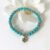 Dyed Turquoise Beaded Bracelet With Flower Charm