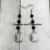 Handcrafted Drop Earrings with Black Czech Glass Bicone beads and Silver Plated Crescent Moon charms.