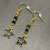 Handcrafted Drop Earrings with deep green czech crystal beads and 18k Gold Filled Star charms. Sparkly Earrings.