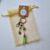 Handmade Beaded Bag Charm with Earthy Tones and Green Tassel