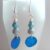 Handmade Blue Beaded Drop Earrings with Shell Discs and Stardust Beads – Ocean-Inspired Dangly Earrings