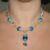 Handmade Blue Glass Bead Necklace with Bird Charm – Artisan Wirework & Lampwork Beads