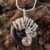 Handmade Hematite Pendant Necklace – Wirework Wrapped Donut Gemstone in Silver