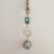Handmade Paua Shell Bag Charm – Clip-On Keychain with Textured Silver Ring and Floral Glow Bead
