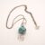 Handmade Turquoise Lampwork Bead Pendant with Silver Wirework Swirl