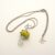 Handmade Wirework Swirl Pendant Necklace with Yellow and Green Lampwork Glass Bead – Unique Beaded Jewellery UK