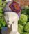 Hand crocheted headband, ear warmer with purple trim.