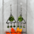 Handmade Stainless Steel Earrings with Green Glitter infused Resin.