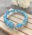Blue Glass Bead Memory Wire Bracelet with Heart Charm