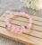 Pink Glass Bead Memory Wire Bracelet With Heart Charm