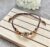 Adjustable Flower Connector Bracelet with Brown Tone Seed Beads