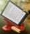 3D Printed Tilted Kindle Holder for Comfortable Reading While Laying Down