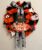 Handcrafted Halloween themed rag door wreath
