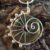 Limited Edition Handmade Green Ceramic Ammonite Pendant – Spiral Wirework Necklace