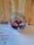 Needle felted dragonfly bauble – purple highlights with red flower