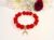Red sparkly Beaded Bracelet with 18K Gold-Plated Crescent Moon Charm
