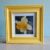 A framed photographic picture of a ‘Spring daffodil’. All proceeds to The Stroke Association